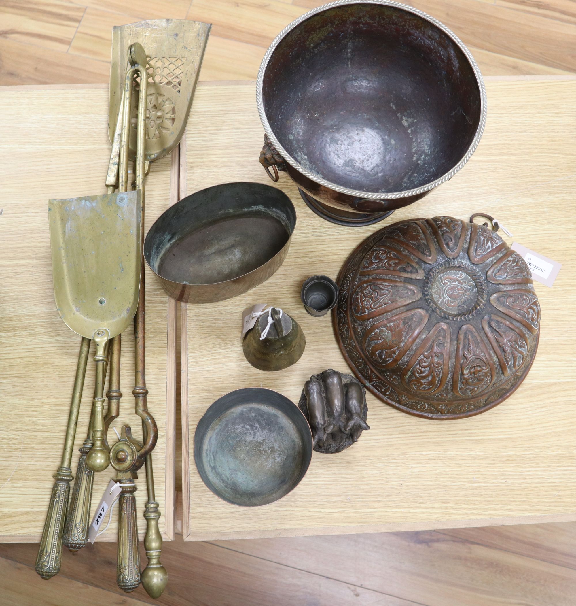 A set of three Georgian gilt bronze fire implements, a similar brass shovel and sundries,